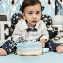 Baby Boy Smashing the Cake on Birthday