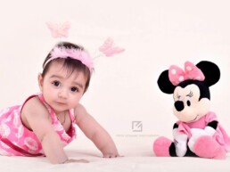 Baby with Minie-Mouse Toy